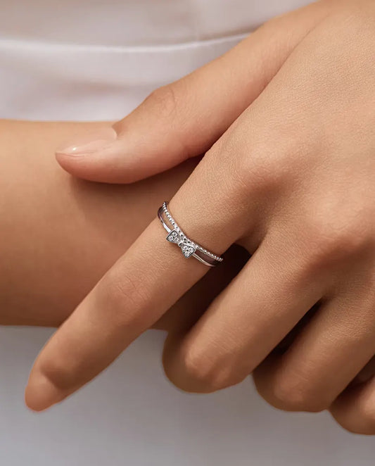 Bague Nœud Zircone - nœud pavé de 3,5 x 7 mm sur un double anneau à fil perlé, réglable, argent 925, US 6 à 9
