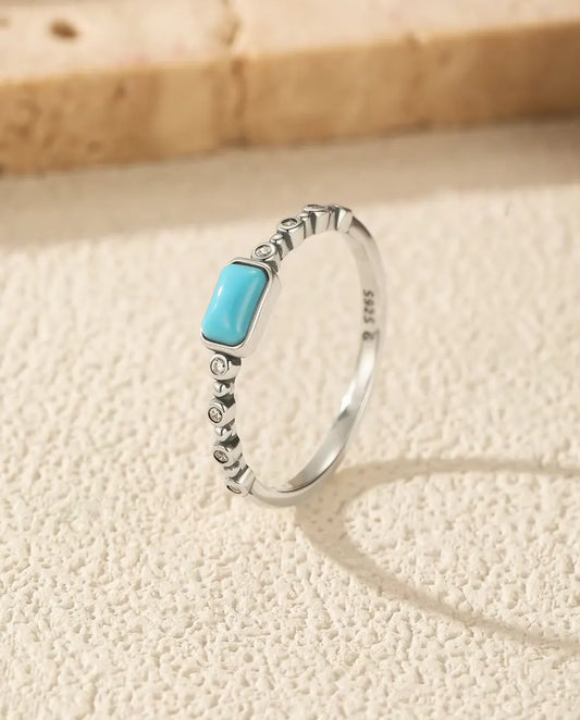 Bague Turquoise - cabochon rectangulaire sur anneau perlé serti de zircons, tailles 5 à 9, argent 925