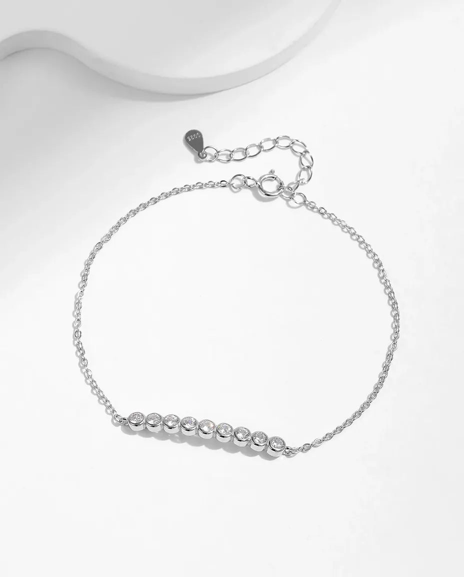 Bracelet moissanite 9 pierres – rondes de 2,5 mm serties clos en argent 925, 16+4 cm réglable