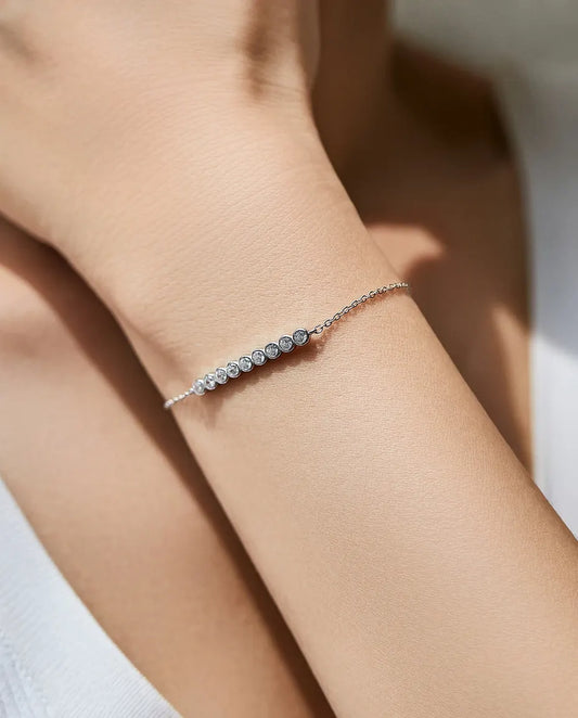 Bracelet moissanite 9 pierres – rondes de 2,5 mm serties clos en argent 925, 16+4 cm réglable