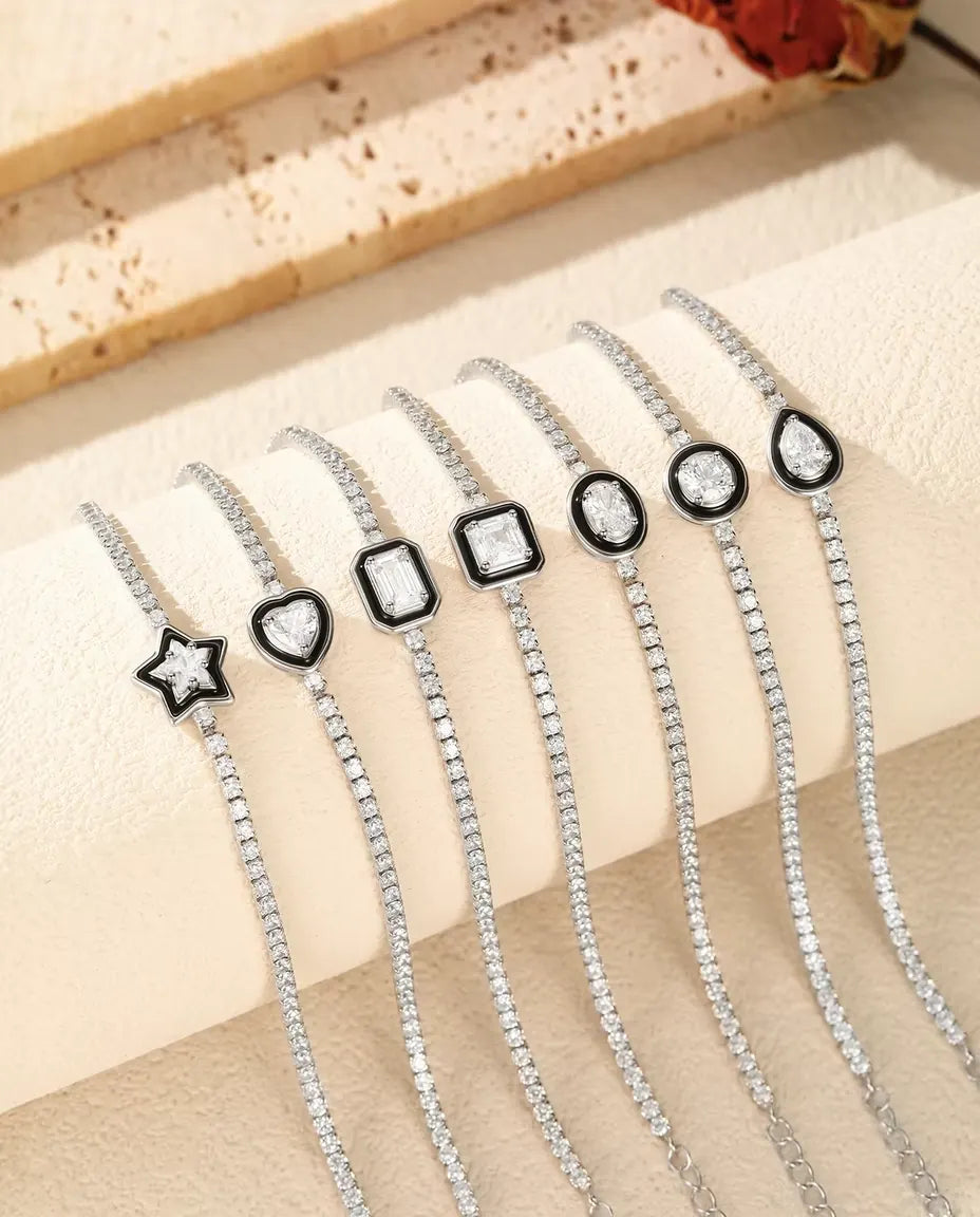 Bracelet Tennis en Argent 925 avec Zircone Centrale au Cadre Noir - les sept formes de pierre côte à côte