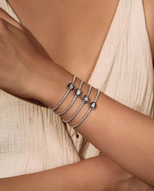 Bracelet Tennis en Argent 925 avec Zircone Centrale au Cadre Noir - quatre formes superposées au poignet
