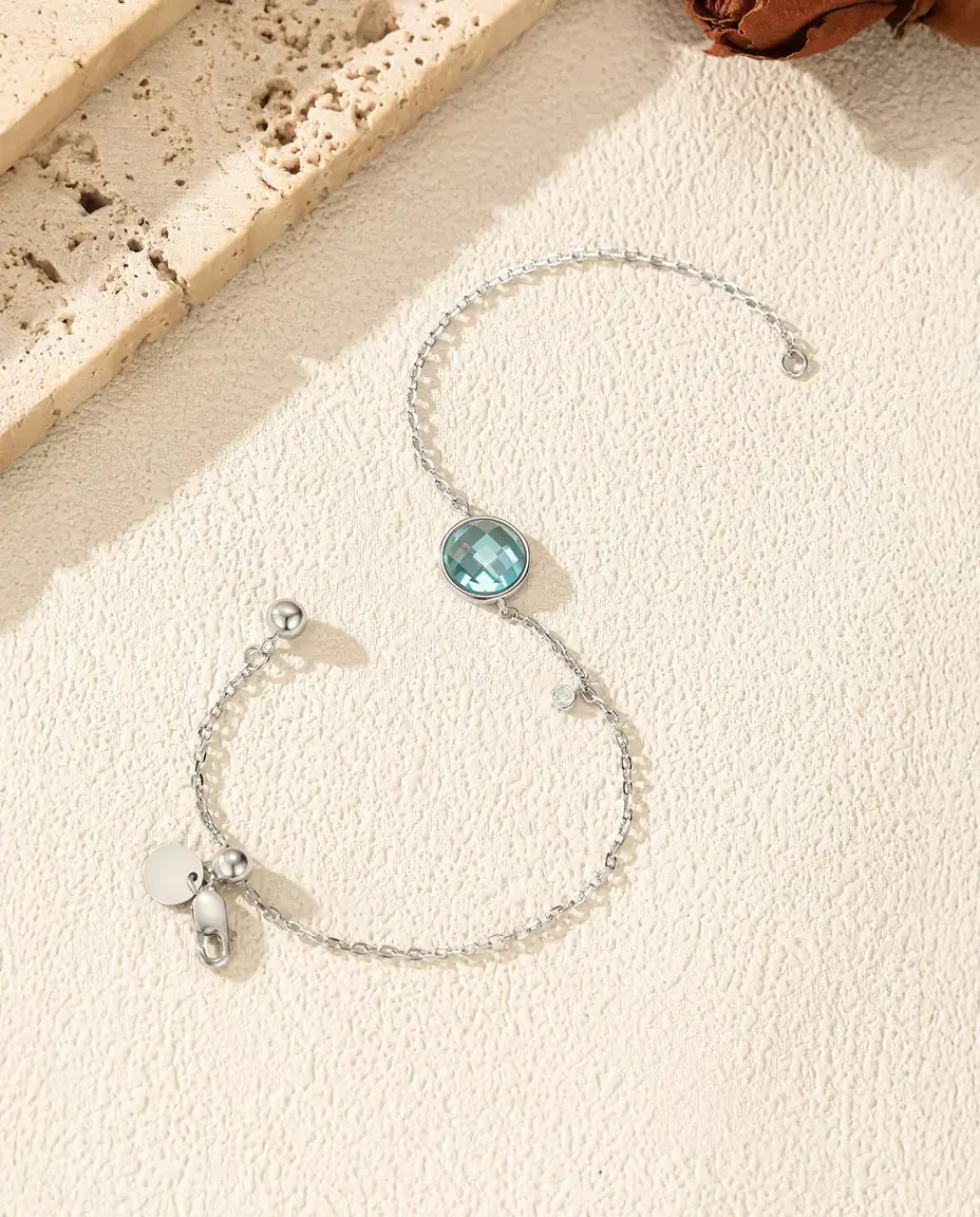 Bracelet à zircon bleu - taille damier 8 mm sur chaîne forçat à fermoir coulissant, argent 925