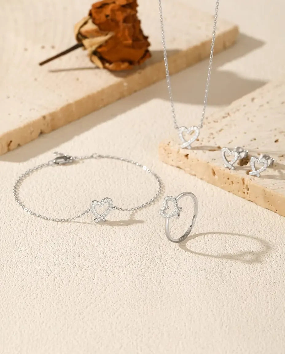 Parure moissanite cœur ajouré en argent 925 : collier, bracelet, bague et puces d’oreilles