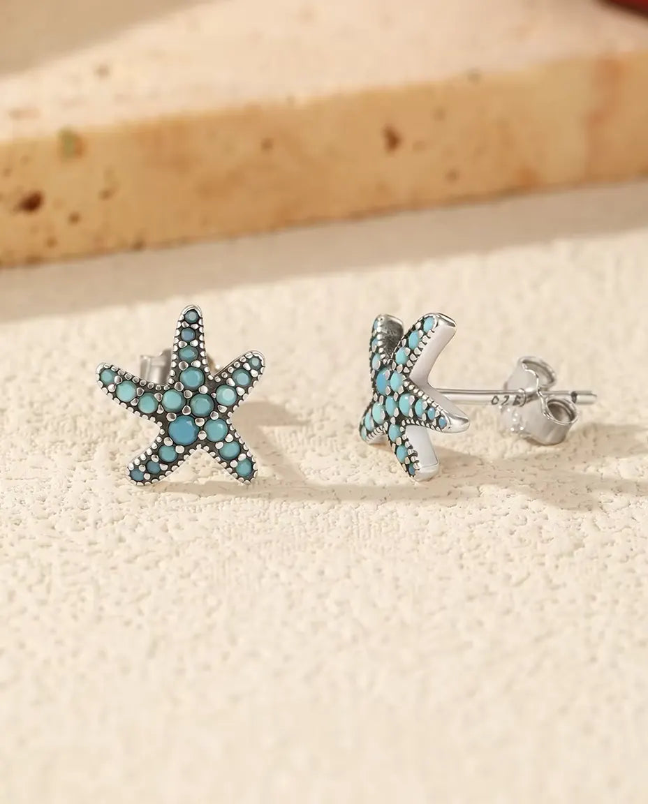 Puces Étoile de Mer Turquoise pour Femme - 10 mm, argent 925 patiné et pavage de pierres bleu turquoise