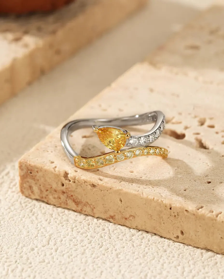 Bague Croisée Bicolore - poire jaune au croisement de deux anneaux pavés, tailles 5 à 9, argent massif 925