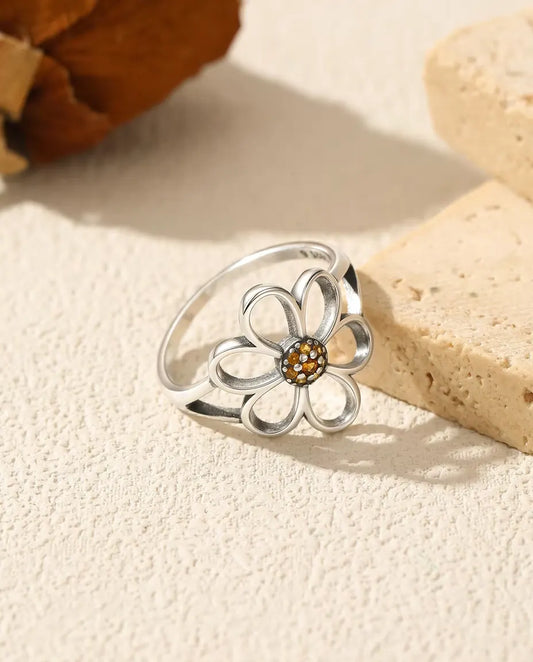 Bague fleur ouverte - pétales ajourés autour d'un cœur pavé orange en argent 925 massif, tailles US 5 à 9