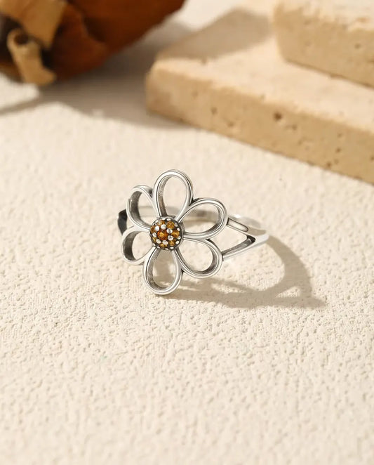 Bague fleur ouverte - pétales ajourés autour d'un cœur pavé orange en argent 925 massif, tailles US 5 à 9