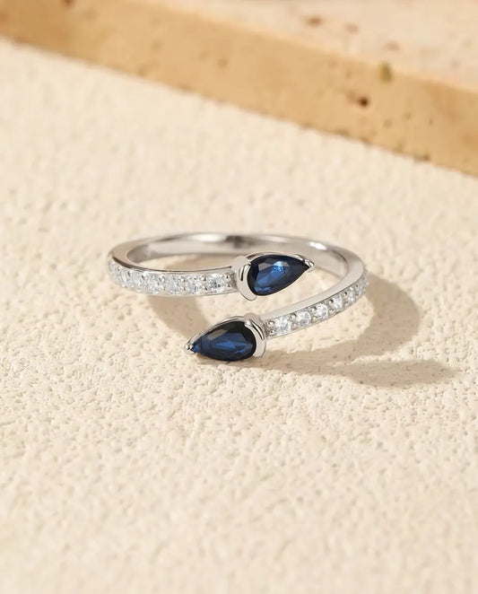 Bague Ouverte Poires Bleues - Deux pierres taille poire sur anneau pavé ouvert, argent 925, ajustable