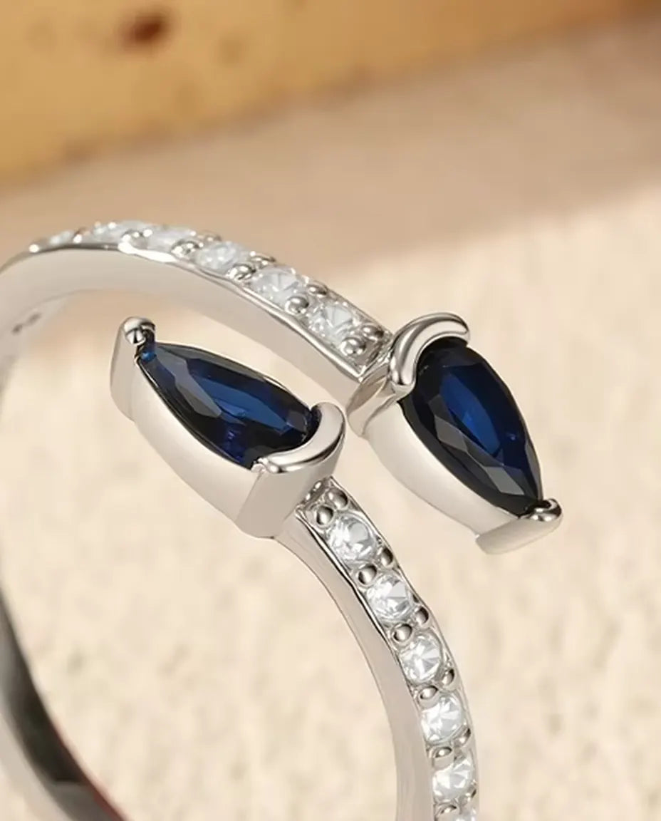 Bague Ouverte Poires Bleues - Deux pierres taille poire sur anneau pavé ouvert, argent 925, ajustable
