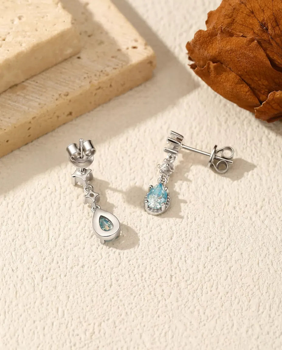 Boucles d'Oreilles Moissanite Bleu Aqua - une poire de 0,50 ct 4 x 6 mm par boucle avec accents en zircon, argent 925, 18 mm
