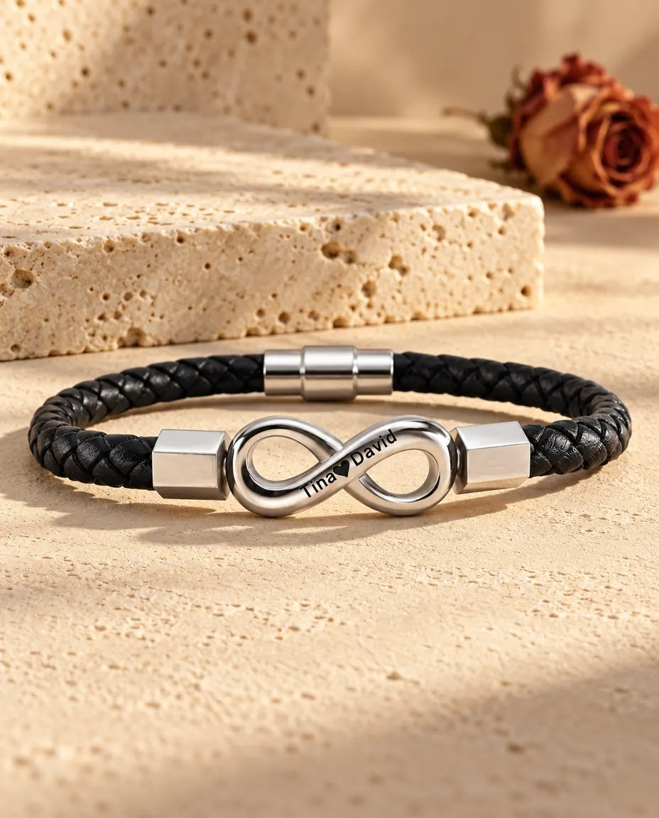 Infini argenté en acier inoxydable avec embouts hexagonaux sur un bracelet en similicuir tressé noir