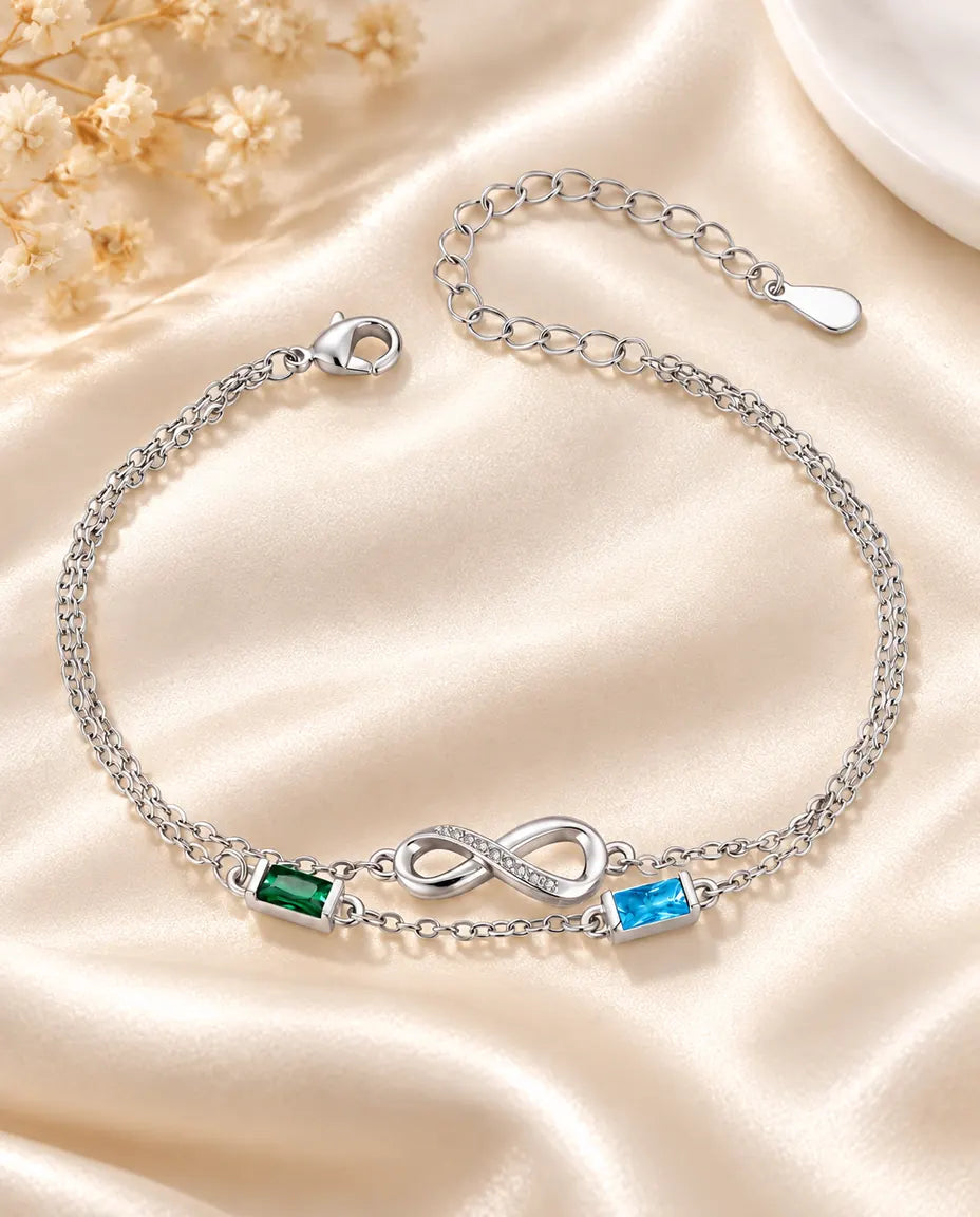 Bracelet infini personnalisé avec deux pierres de naissance baguette sur double chaîne