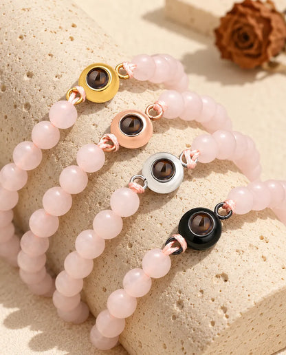 Bracelets de perles rose poudré avec charm doré, or rose, argenté et noir