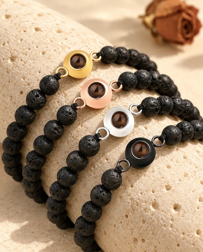 Bracelets en pierre de lave noire avec charm doré, or rose, argenté et noir