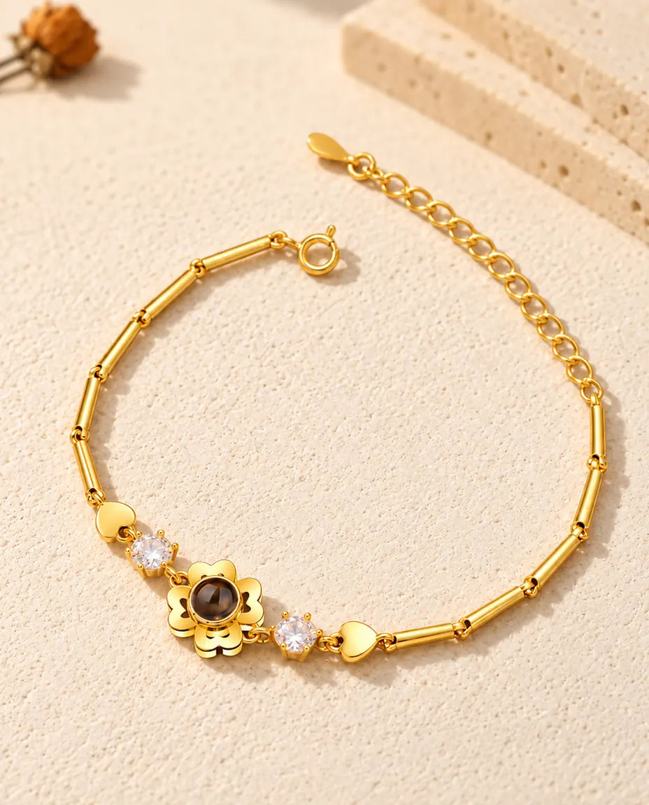 Bracelet trèfle doré à pétales en cœur, fermoir anneau ressort et extension