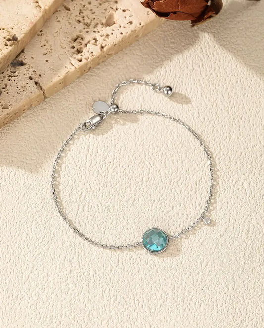 Bracelet à zircon bleu - taille damier 8 mm sur chaîne forçat à fermoir coulissant, argent 925