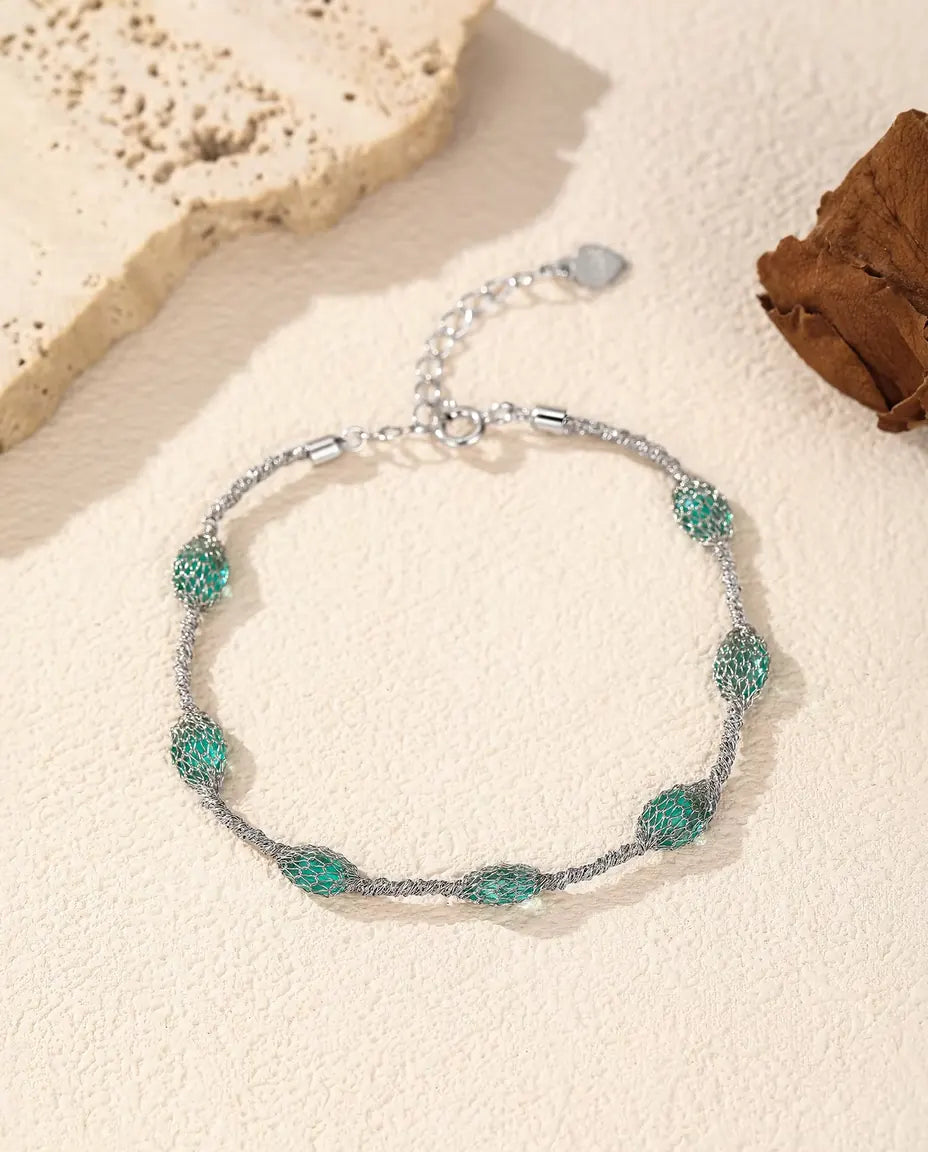Bracelet Zircons en Cage en Argent 925 - version zircons verts, plus près du filet d’argent