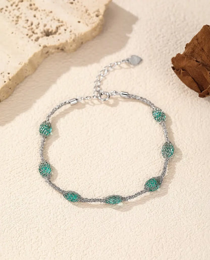 Bracelet Zircons en Cage en Argent 925 - version zircons verts, plus près du filet d’argent