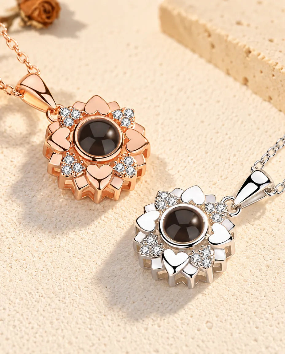 Pendentifs fleur de cœurs couleur or rose et argenté côte à côte