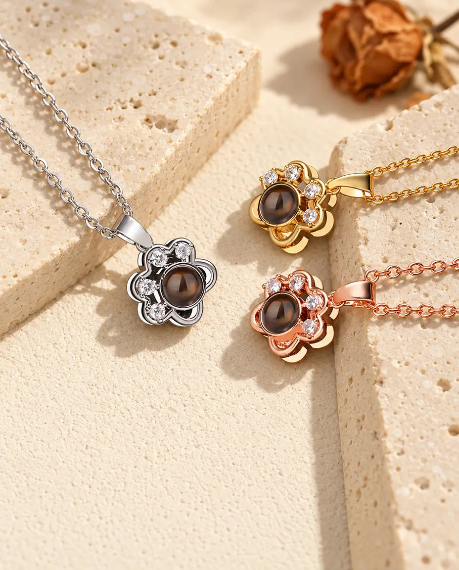 Pendentifs patte argenté, doré et couleur or rose aux doigts en zircons